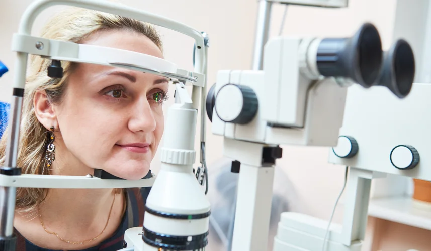 Portrait of ophthalmologist looking at camera during eye examination