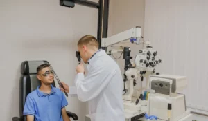 Vision screenings performed during routine eye exam using modern diagnostic equipment for early detection.